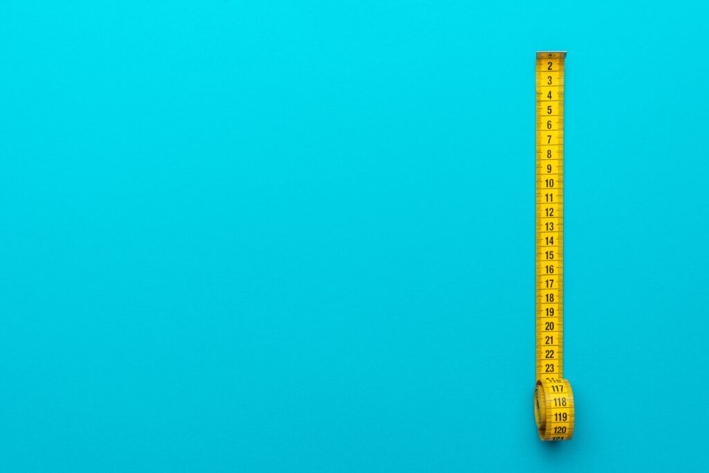 Top,View,Of,Yellow,Soft,Measuring,Tape.,Minimalist,