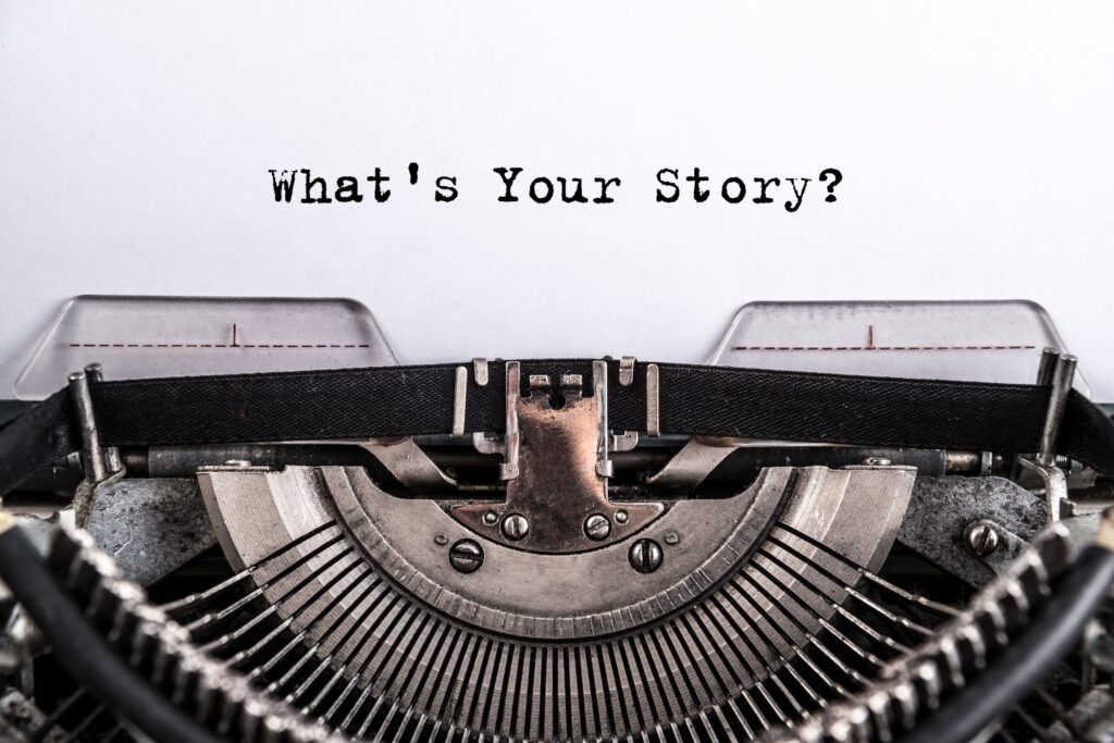 typewriter with words whats your story