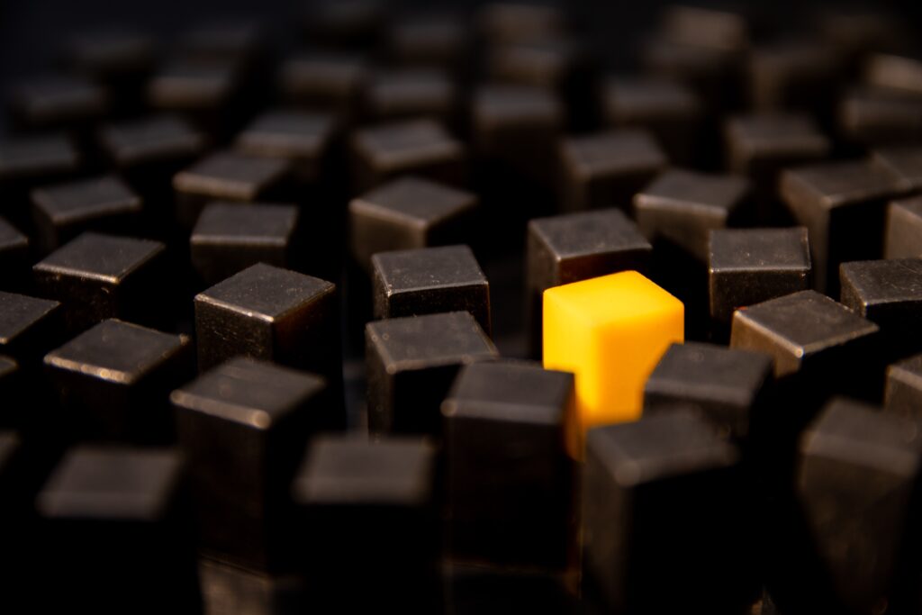 Yellow,Cube,Contrasting,With,Others,Of,Black,Color,,Inclusion,,Difference
