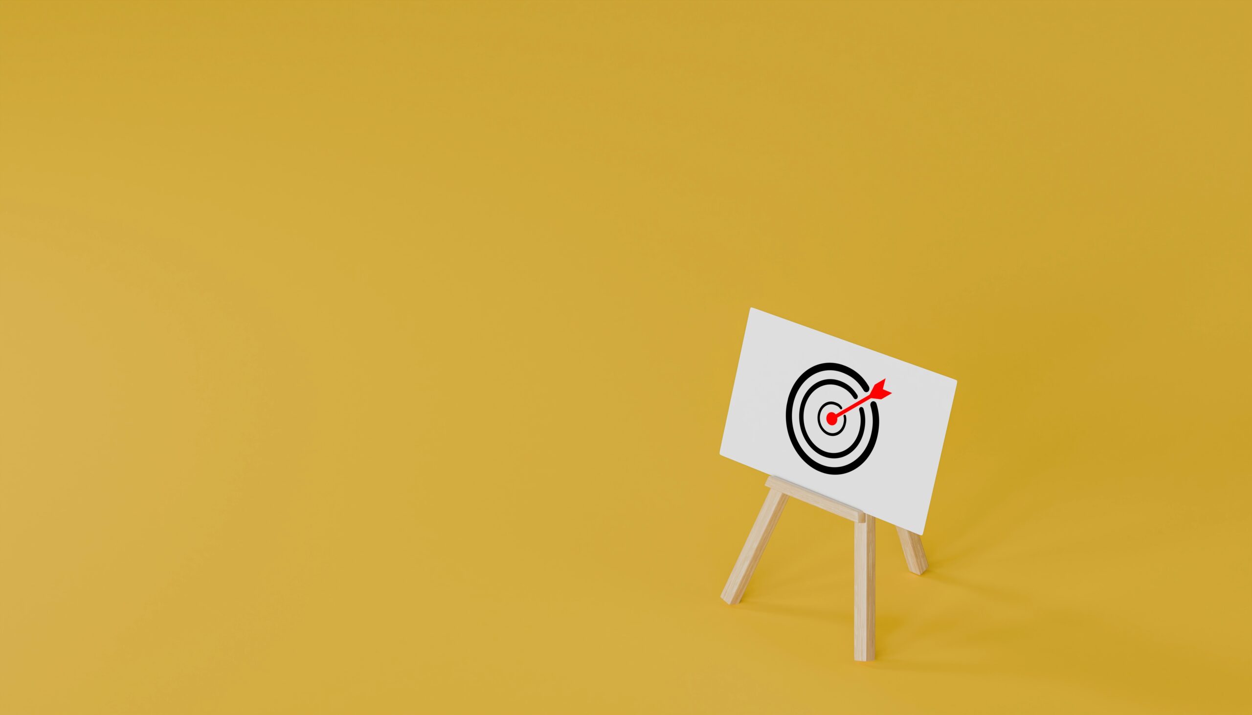 red arrow on board on yellow background