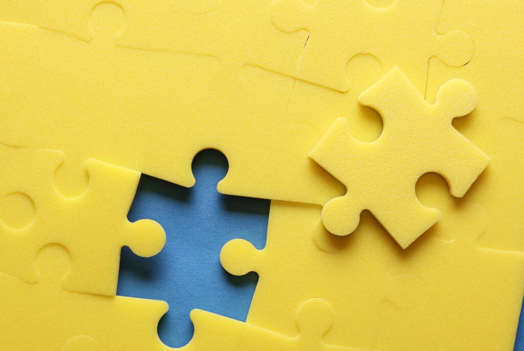 yellow puzzle pieces on blue background