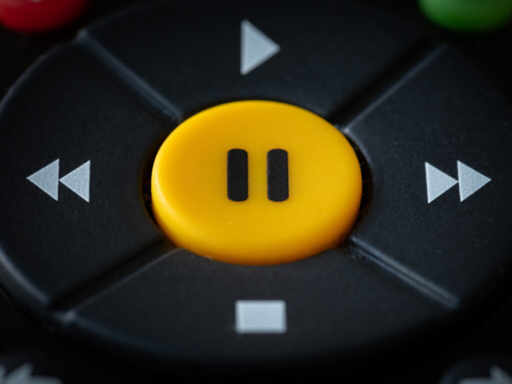 A,Big,Yellow,Pause,Button,On,A,Tv,Remote
